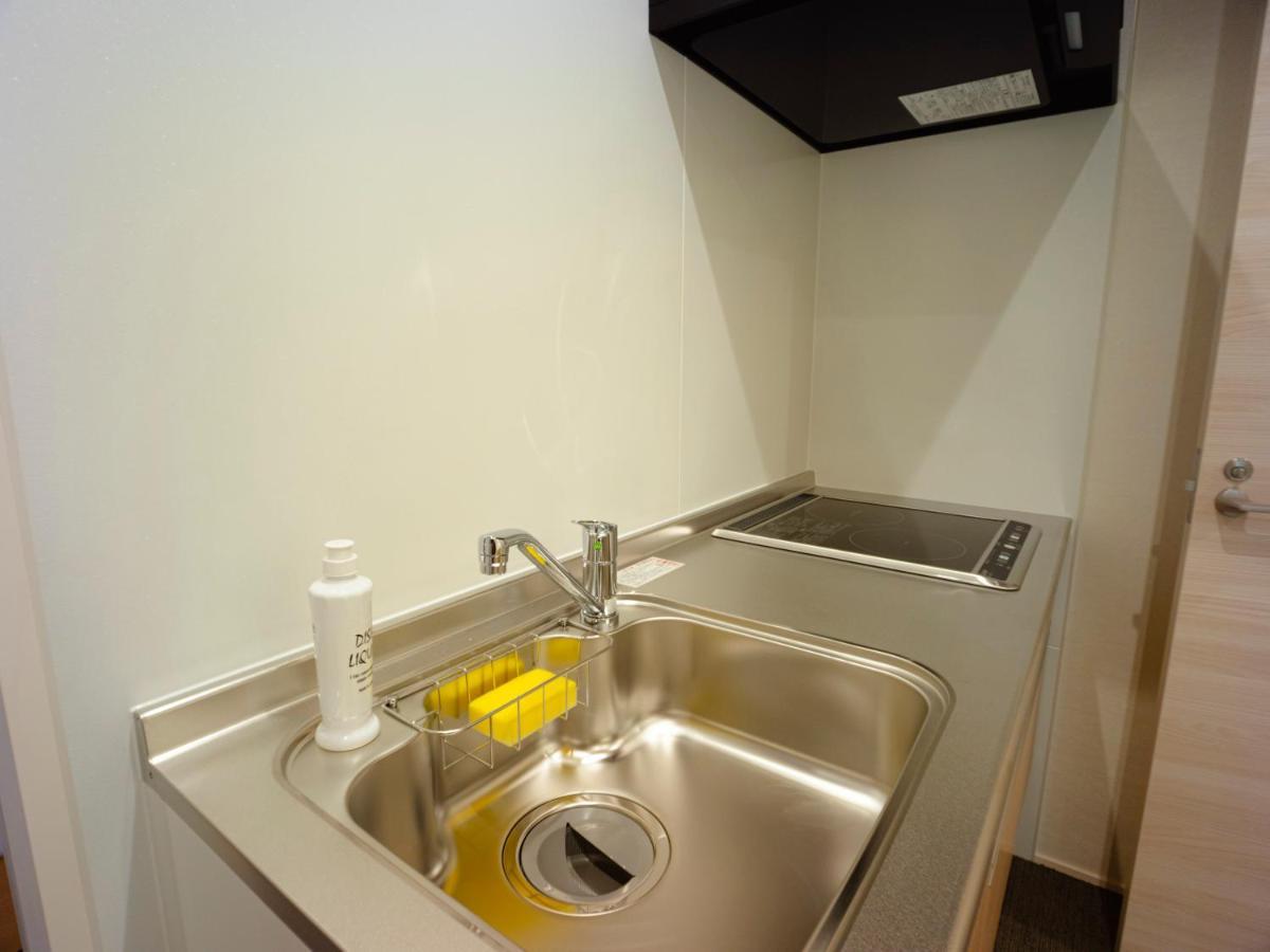 Appartamento Grand Base Sumiyoshi Fukuoka  Esterno foto