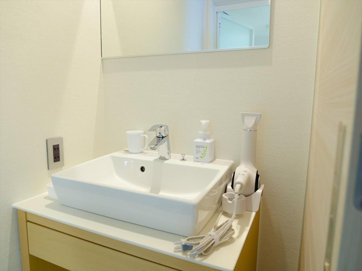Appartamento Grand Base Sumiyoshi Fukuoka  Esterno foto